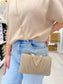 V Buckle Clutch