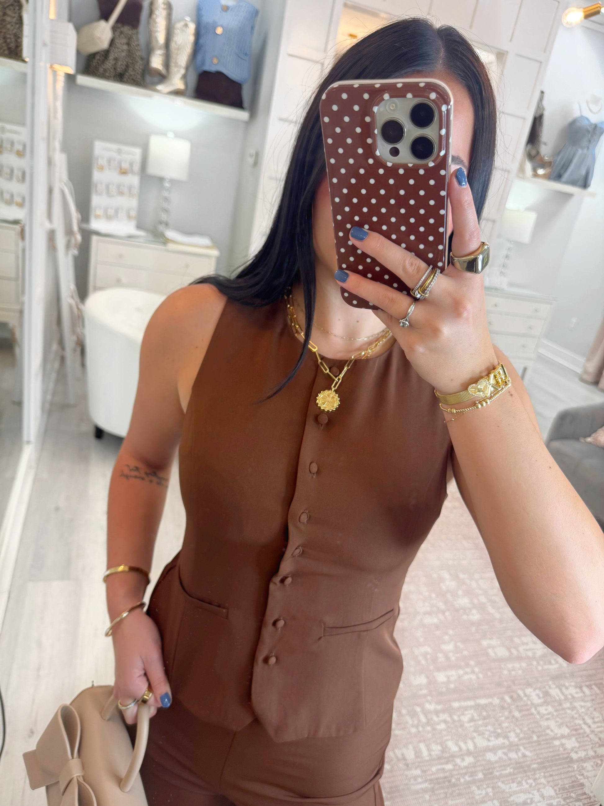 Flattering vest, sleeveless vest, button down vest , work top, classy top, elegant top, professional top, chic vest, and office top