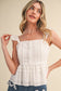 Mia Eyelet Flutter Sleeve Peplum Top