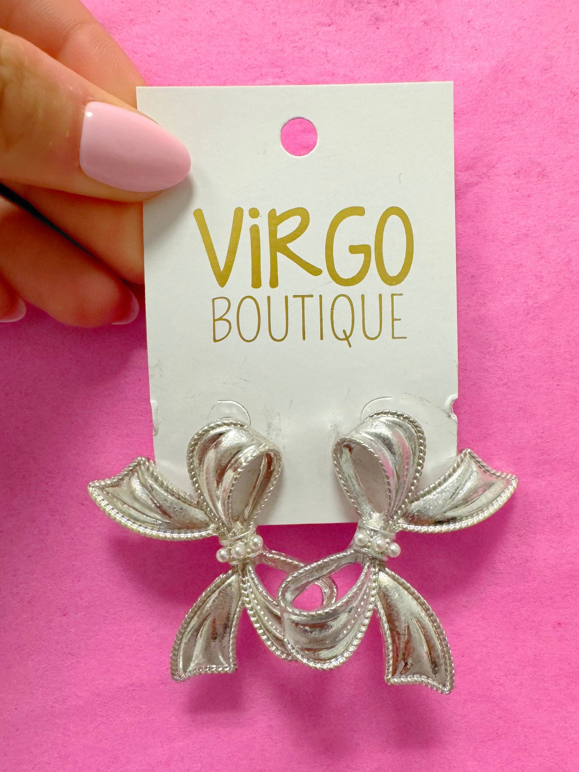 bow earring
Silver earrings
Ribbon earring